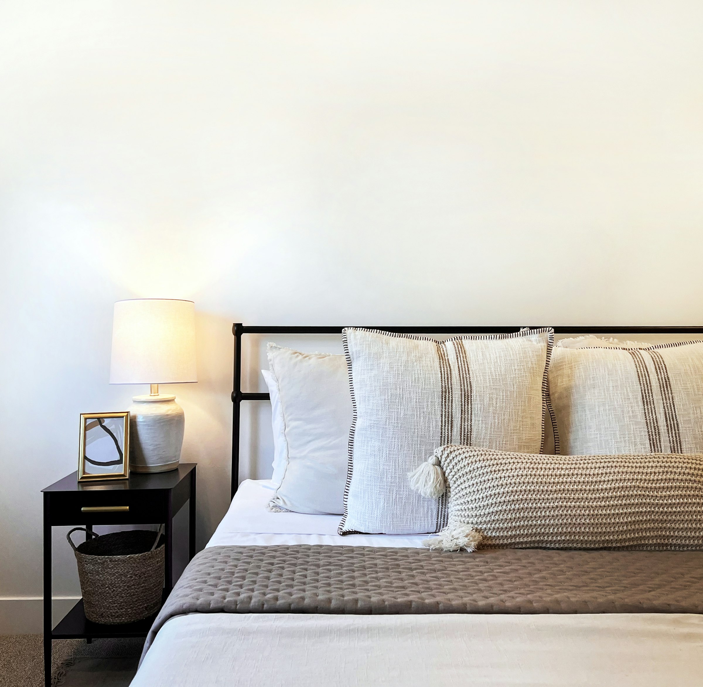 Quiet linen room in low lamplight