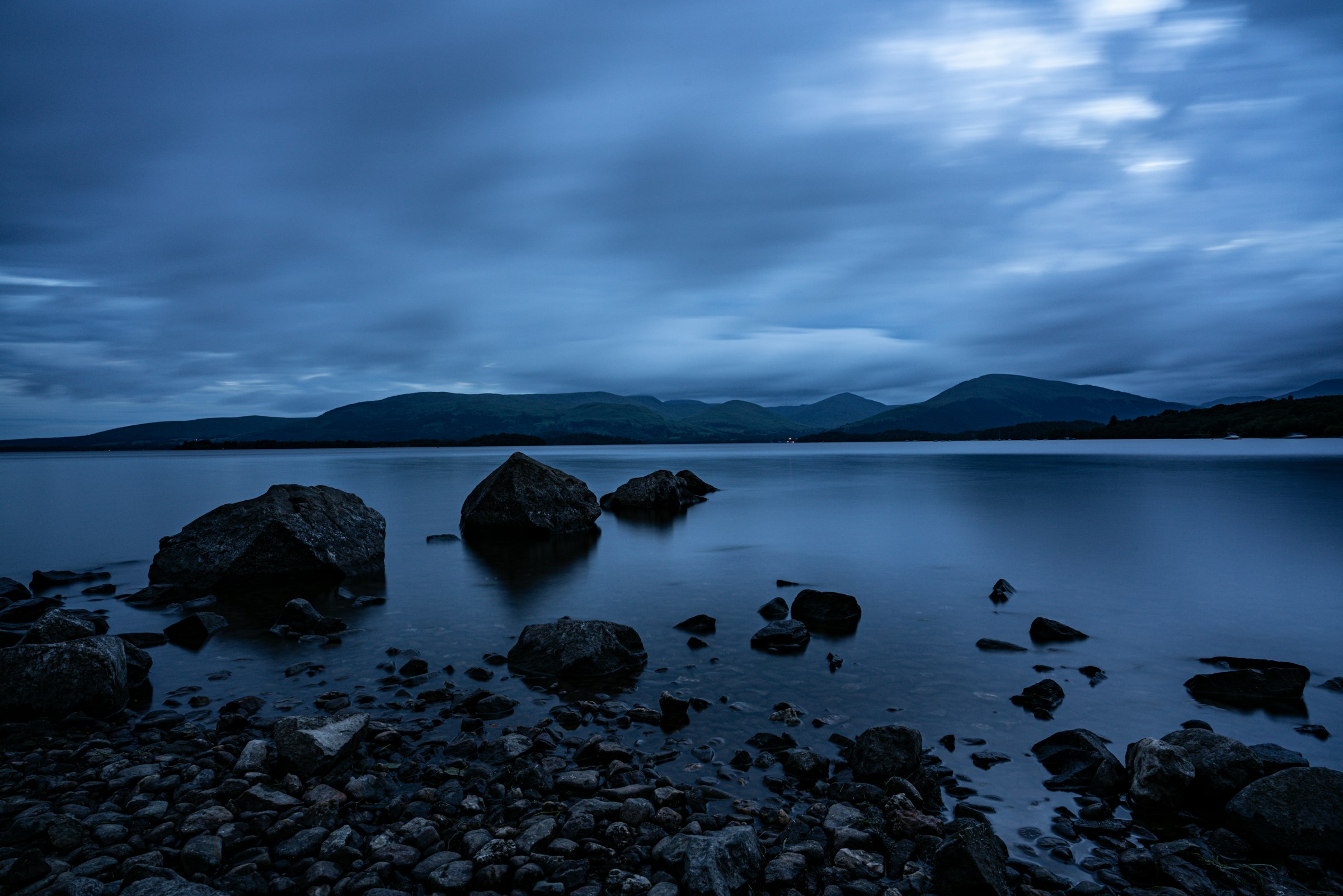 Dark loch at blue hour, long exposure