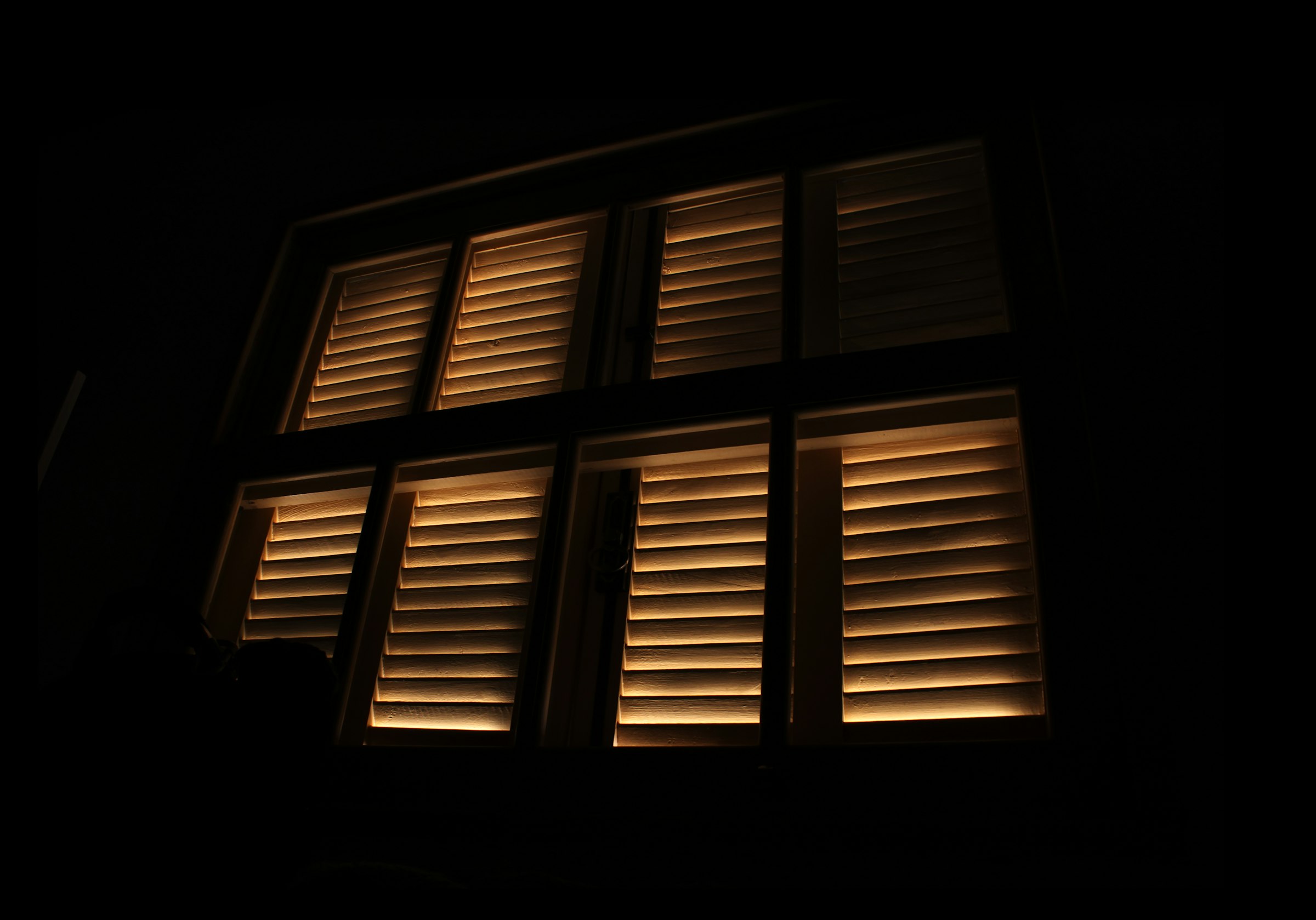Warm-lit walkway at night